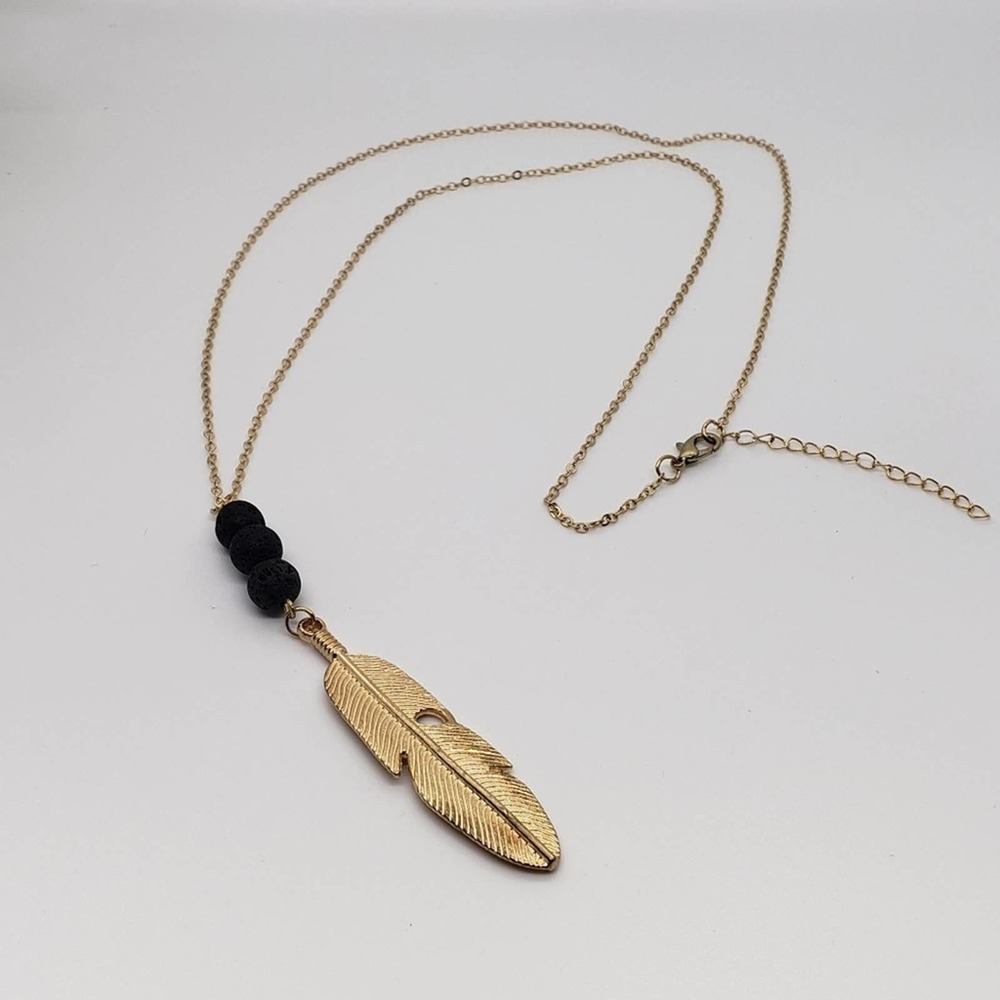 Feather and lava bead statement necklace